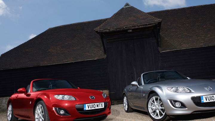 2010 Mazda MX-5 Miyako Red Vs Grey Front Pose